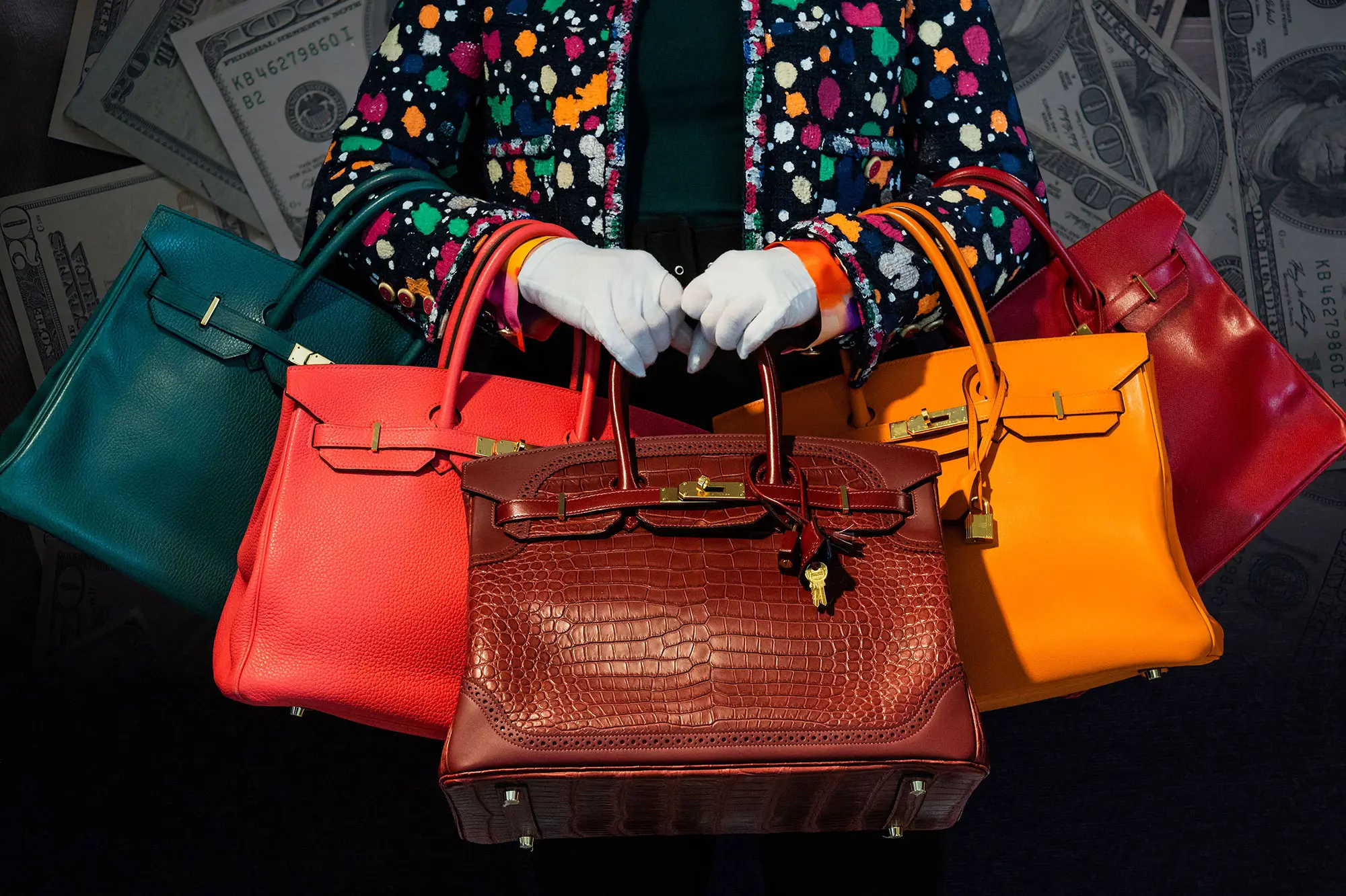 US watchdog files lawsuit to stop takeover of $8.5 handbags