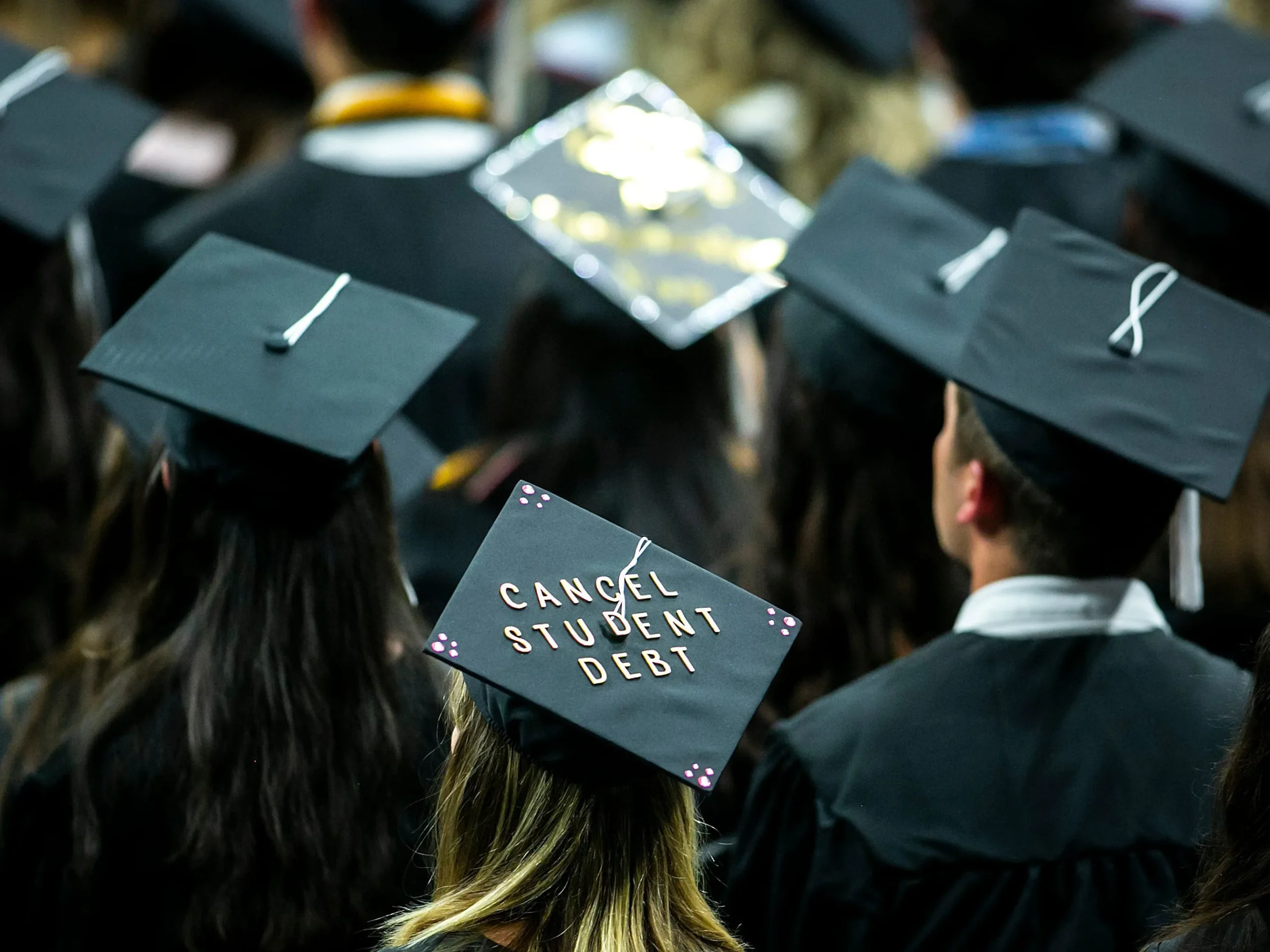 From graduation to retirement, American students are plagued by student debt.